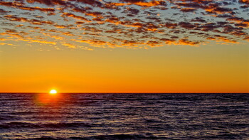 The sun sinking in the Baltic Sea.