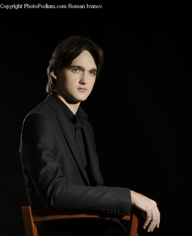 People, Person, Human, Clothing, Overcoat, Suit, Chair
