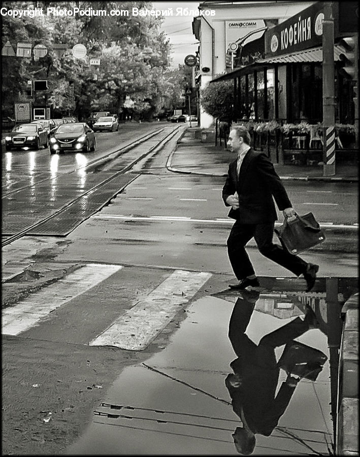 People, Person, Human, Clothing, Overcoat, Suit, Intersection