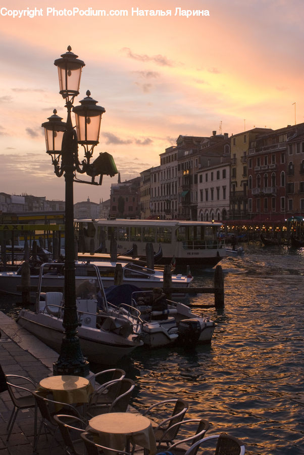 Chair, Furniture, Boat, Watercraft, Lamp Post, Pole, Lantern