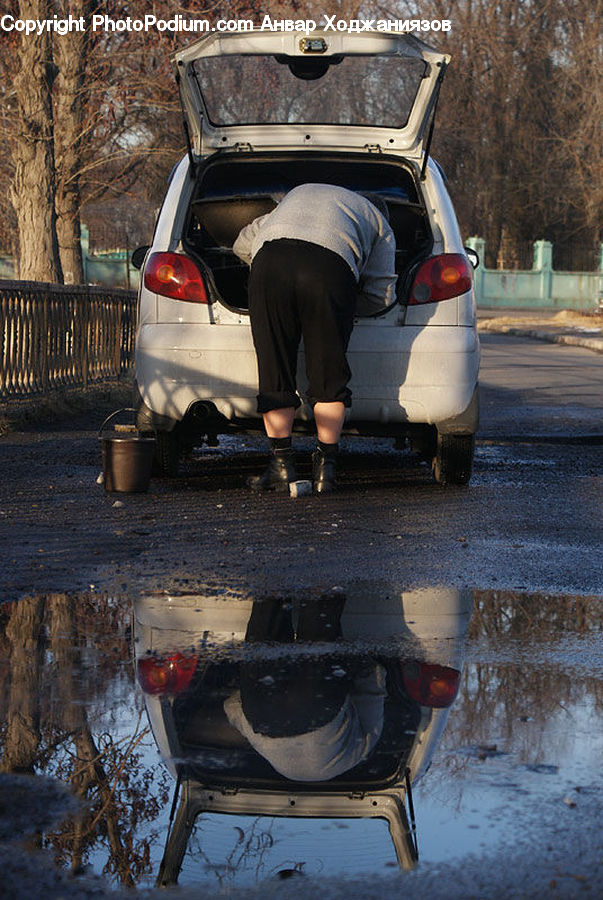 People, Person, Human, Automobile, Car, Vehicle, Puddle