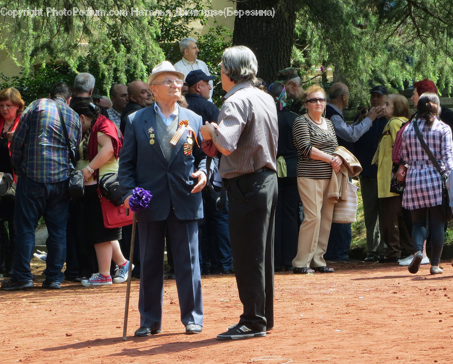 People, Person, Human, Boot, Footwear, Riding Boot, Crowd