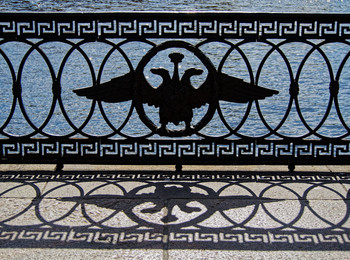 Cast-iron embankment fence with a double-headed eagle. The heart of old Saint Petersburg.